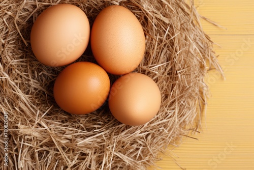 Brown eggs put on a pile of straw