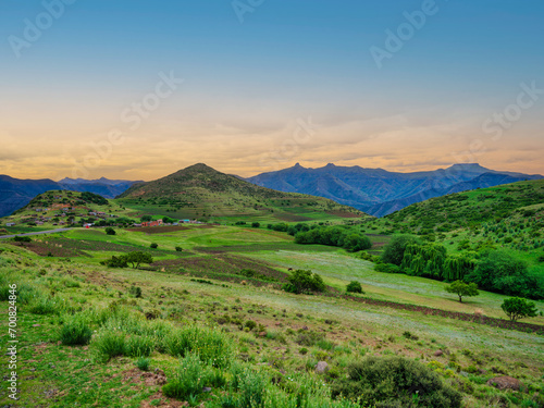 Rolling hills and lush green valley below Mantsa village, Kingdom of Lesotho © Arnold