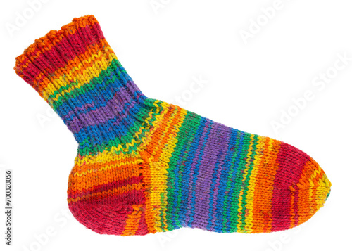 Knitted sock from yarn. Handmade hobby knitting. Rainbow, colorful acrylic, wool or cotton thread. Handcraft, art and craft store. Isolated background