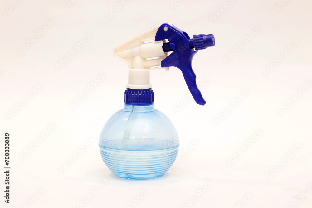 blue spray bottle isolated on white background blue spray bottle isolated on white background