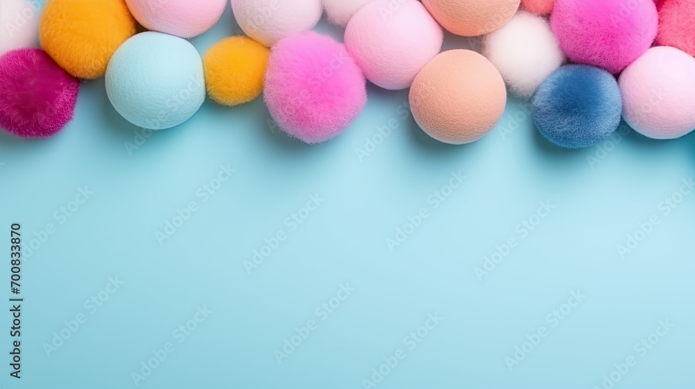 Graphic banner of colorful pastel felt craft pom poms, with copyspace Graphic banner of colorful pastel felt craft pom poms, with copyspace