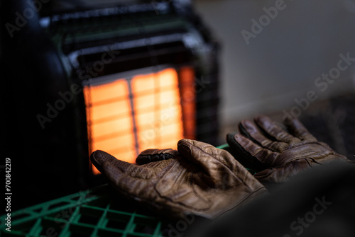gloves being dried by heater