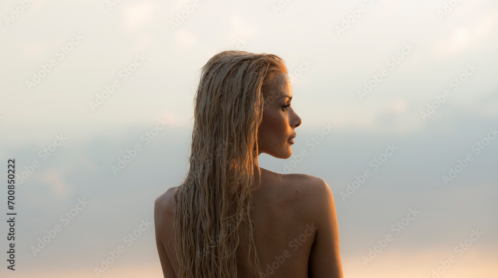 girl in profile at sunset