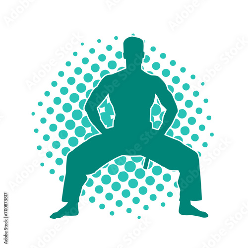 Silhouette of a man in oriental martial art pose. Silhouette of a male in martial art move.