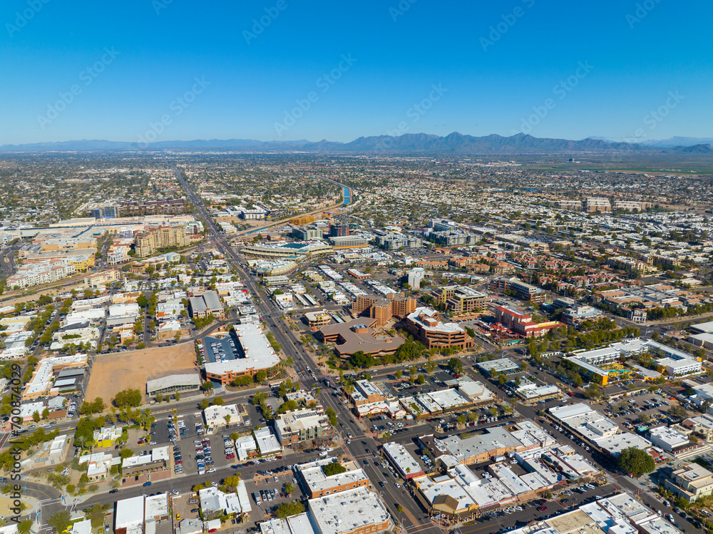 Scottsdale city center aerial view on Scottsdale Road at Main Street with Arizona Canal and McDowell Mountain at the background in city of Scottsdale, Arizona AZ, USA. 