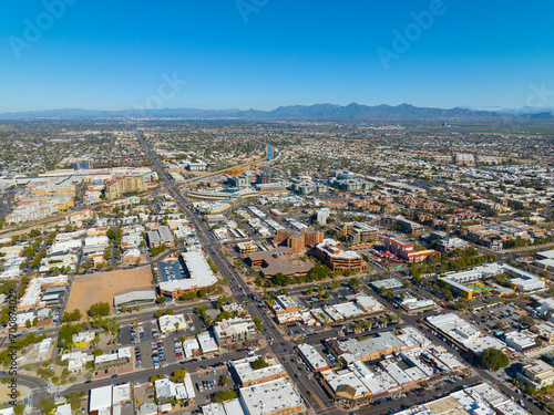 Scottsdale city center aerial view on Scottsdale Road at Main Street with Arizona Canal and McDowell Mountain at the background in city of Scottsdale, Arizona AZ, USA.  photo