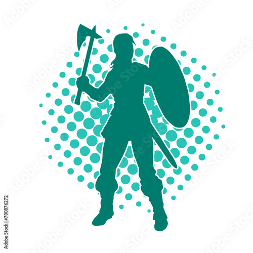 Silhouette of a sexy female warrior in battle armor carrying axe weapon and iron shield.