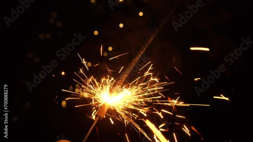 Wallpaper Mural Christmas sparklers candle burns in Christmas tree background. Celebration, Success, New Years Concept. Torontodigital.ca