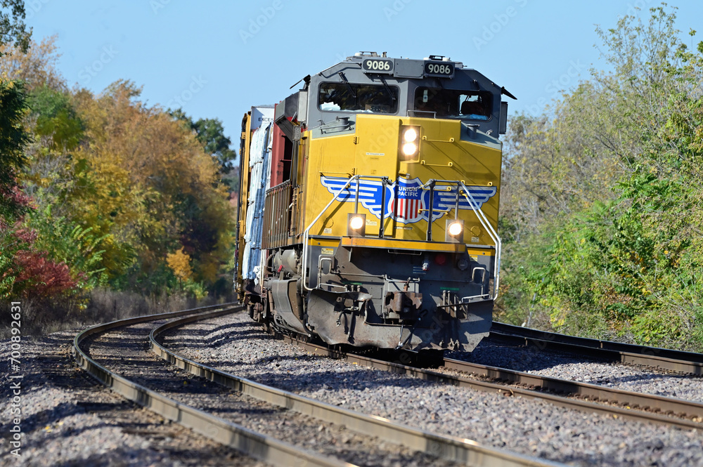 A single locomotive leads a Union Pacific Railroad freight train up a ...