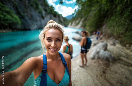 a young happy blond woman w...