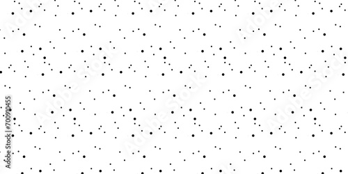 Abstract monochrome dotted texture. Polka dot pattern on white background