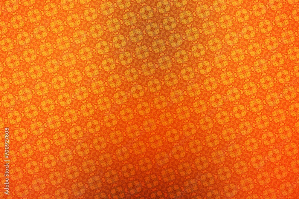 Abstract orange background with a pattern of flowers in the center