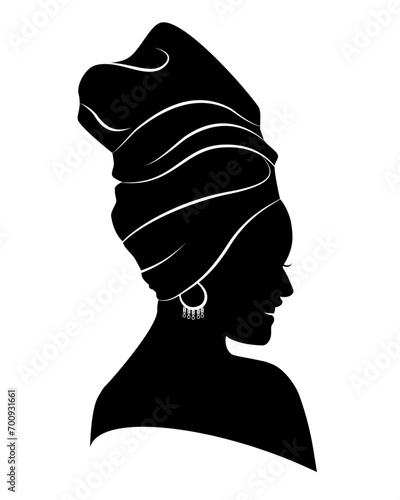 Silhouette of African American woman in a head wrap and an earring. Vector illustration isolated on white