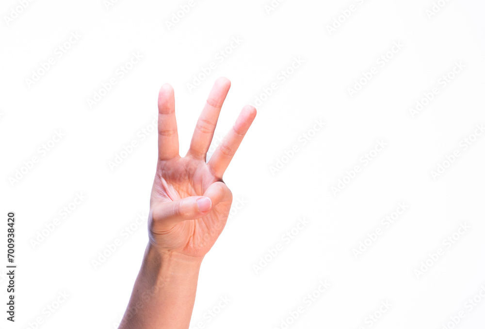 Woman showing three fingers on isolated white background Woman showing three fingers on isolated white background