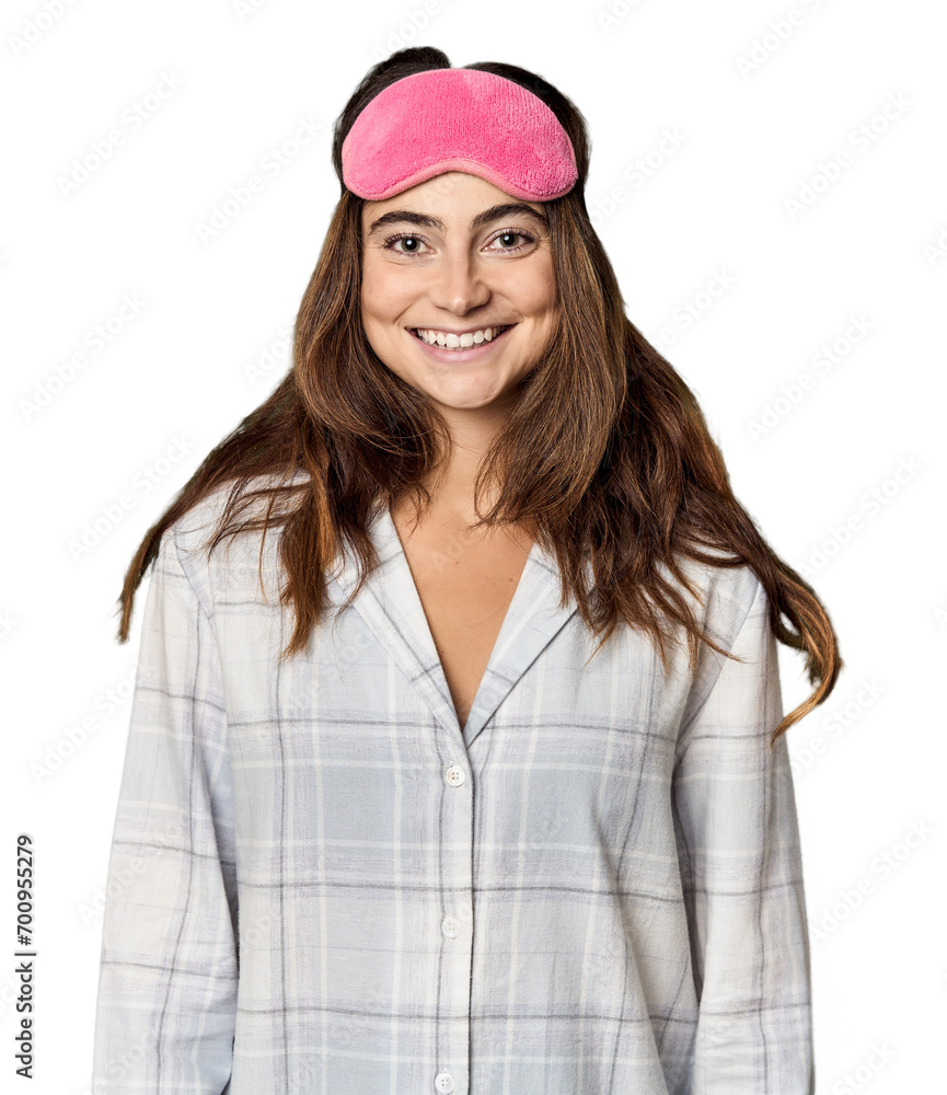 Sleepy Caucasian woman in pajamas with sleep mask Sleepy Caucasian woman in pajamas with sleep mask