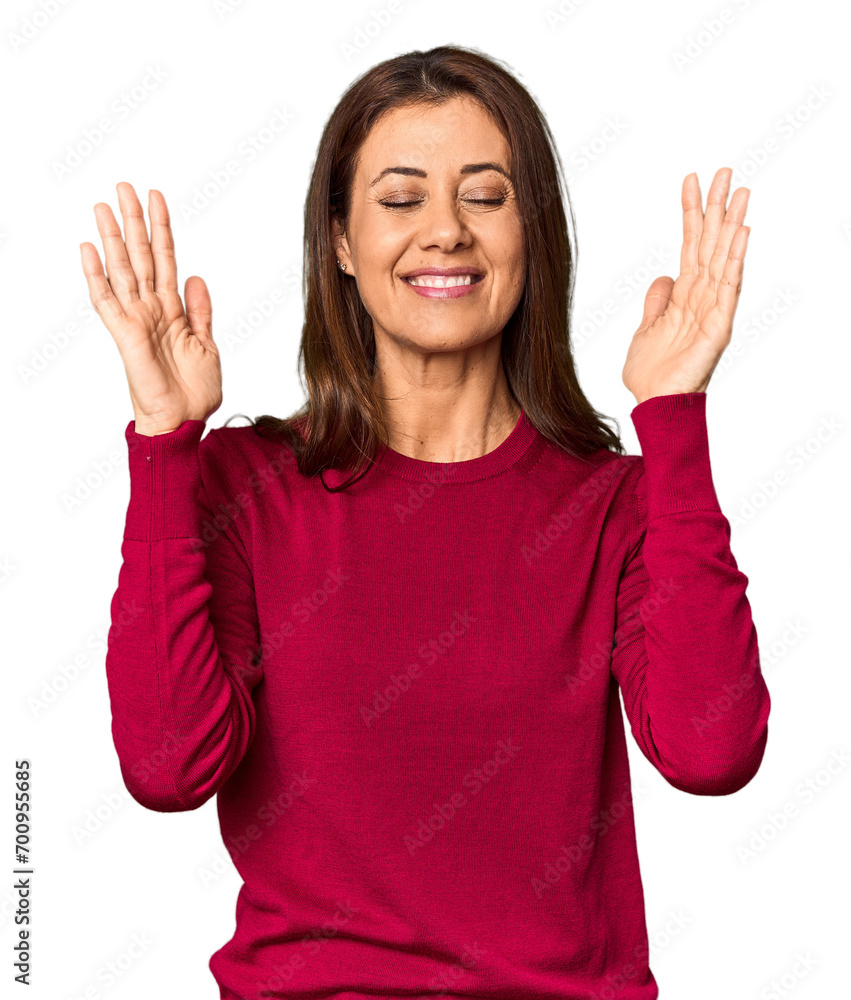 Elegant middle-aged Caucasian woman in studio setting joyful laughing a lot. Happiness concept. Elegant middle-aged Caucasian woman in studio setting joyful laughing a lot. Happiness concept.