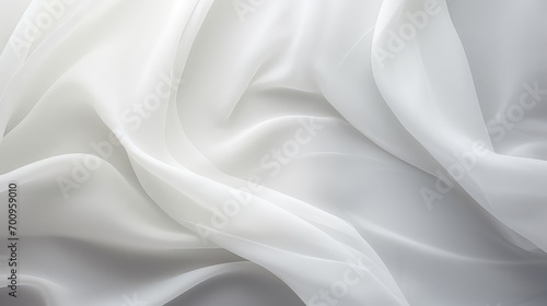 Closeup of rippled white silk fabric lines background photo