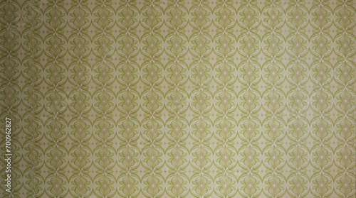 Old wallpaper on the wall. Old wallpaper for texture or background.