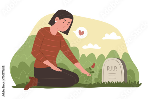 Mourning Woman Sitting in Front of a Grave in a Cemetery