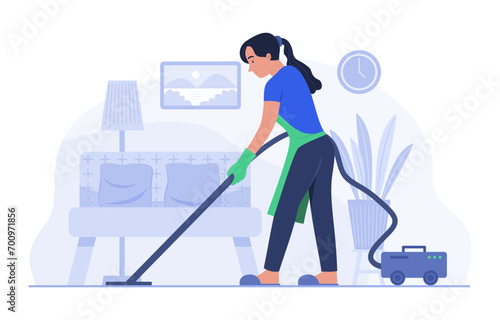 Housekeeper Woman Cleaning Living Room with Electric Vacuum Cleaner