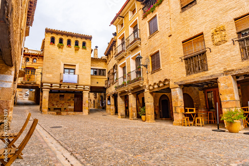 Picturesque Rafael Ayerbe square. Old Plaza Mayor of the Pyrenean town of Alquezar  Huesca  Spain
