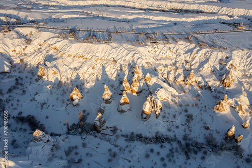 Pigeon Valley and Cave town in Göreme in winter, Fairy chimneys, Cappadocia, Turkey.