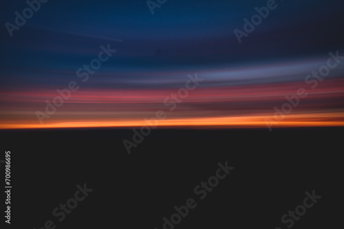 Abstract sunset in the sky, blurry background