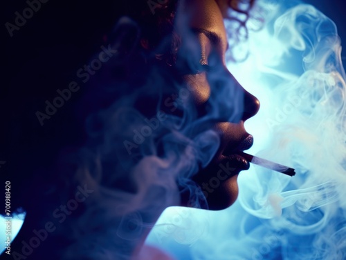 Close - up, a cloud of smoke in silhouette of a woman