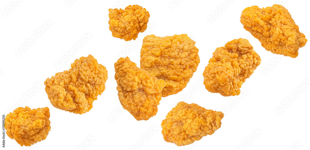 Falling chicken nuggets isolated on white background Falling chicken nuggets isolated on white background