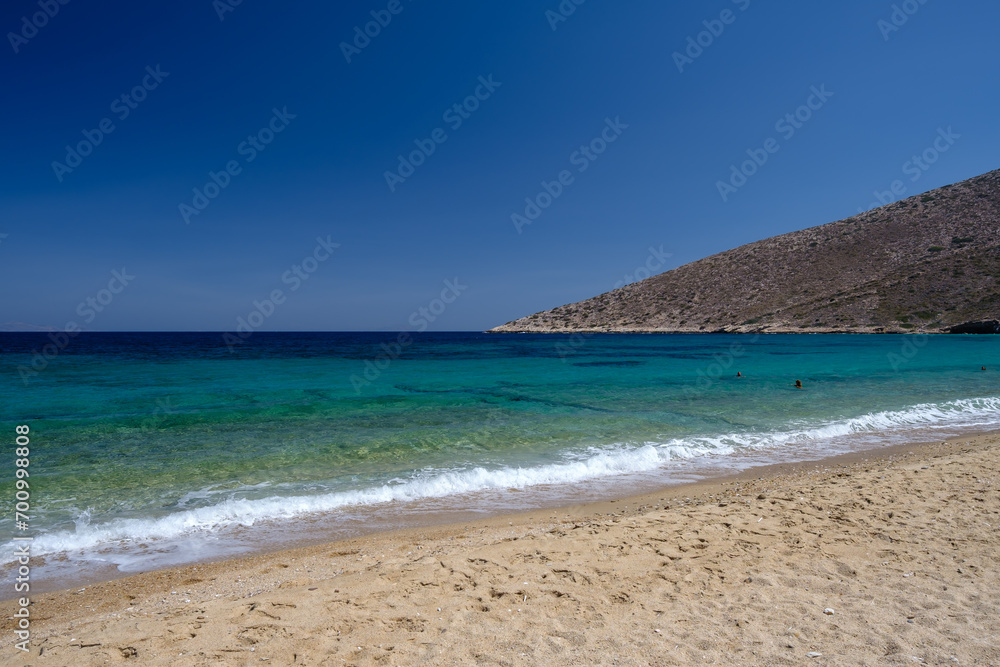 Panoramic view of the amazing sandy and turquoise dream beach of Agia Theodoti in Ios Cyclades Greece