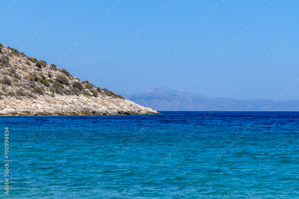 View of the Aegean Sea in Ios Greece and the island of Irakleia in the background