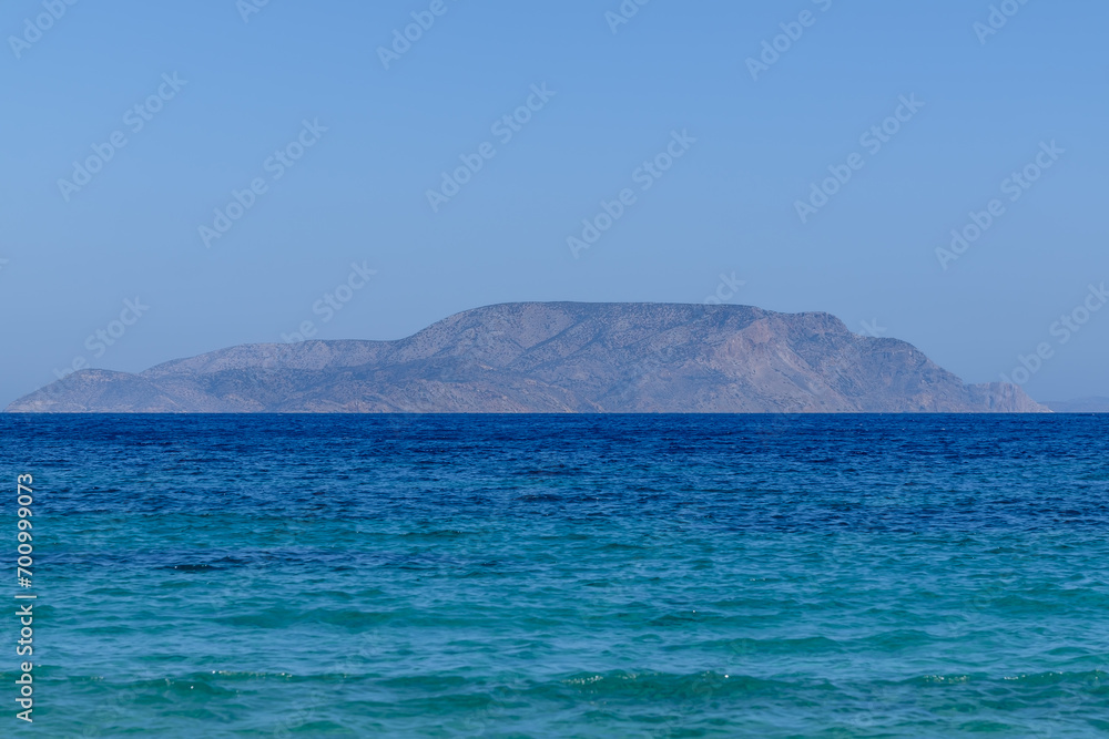 Fototapeta premium View of the Aegean Sea in Ios Greece and the island of Irakleia in the background