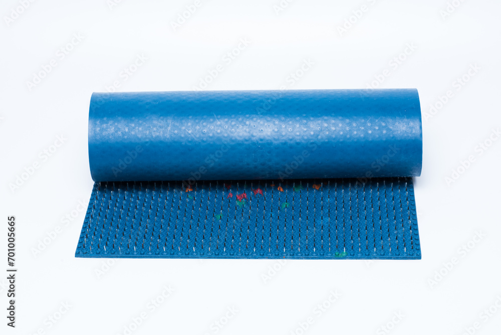 Lyapko applicator or acupuncture massage mat on white background. Alternative or unconventional medicine. Lyapko applicator or acupuncture massage mat on white background. Alternative or unconventional medicine.