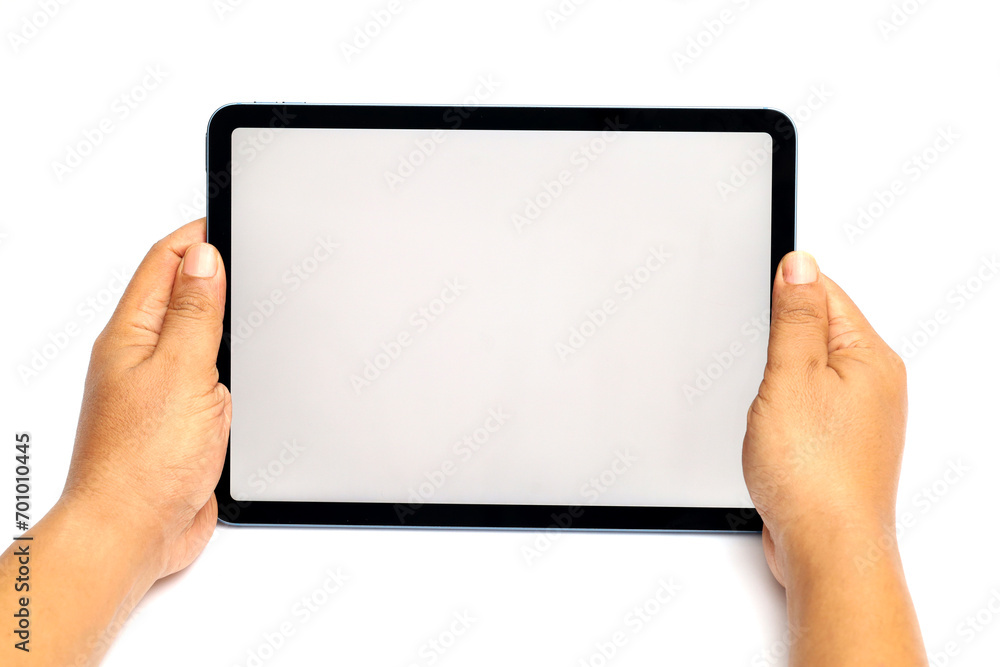 hand holding a computer tablet or smartphone with a white blank screen. hand holding a computer tablet or smartphone with a white blank screen.