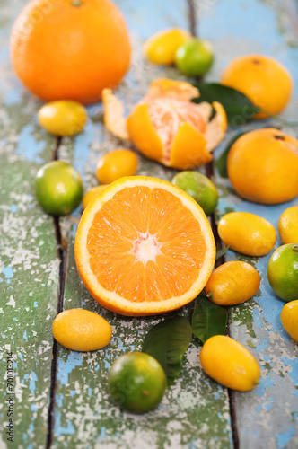 Fresh citrus fruits on the wooden table