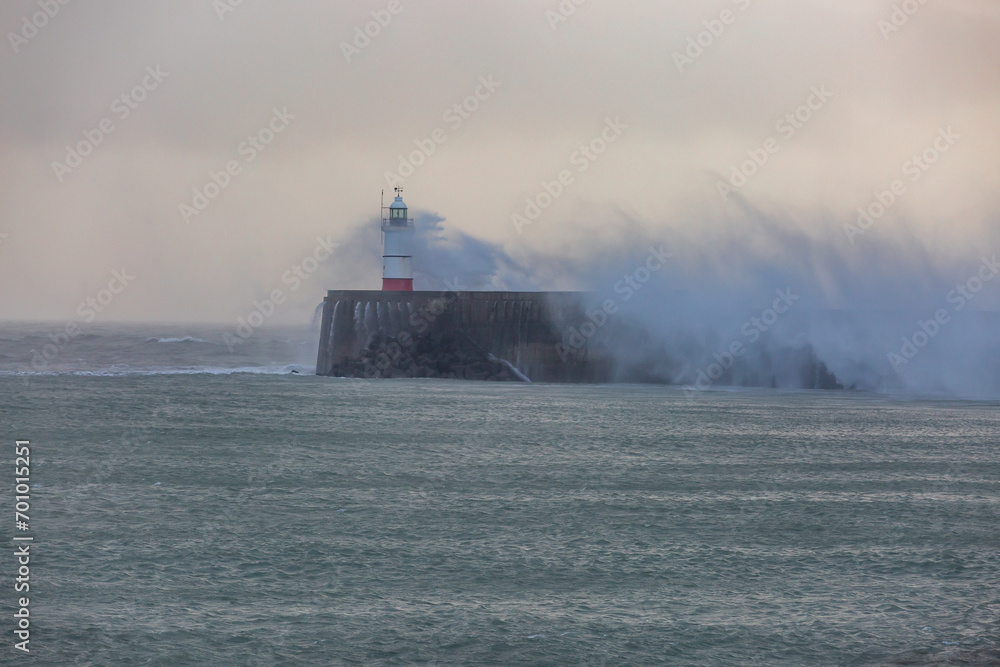 Newhaven lighthouse on the Sussex coast, during a winter storm