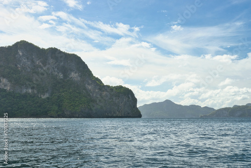 PALAWAN, PHILIPPINES - DECEMBER 21, 2023: Tropical Shimizu Island and paradise beach, El Nido, Palawan, Philippines. Tour A Route. Coral reef and sharp limestone cliffs.  © Scotts Travel Photos
