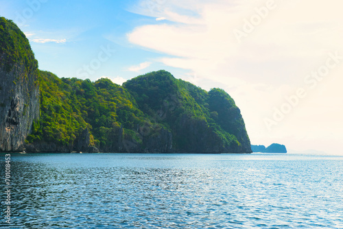 PALAWAN, PHILIPPINES - DECEMBER 21, 2023: Tropical Shimizu Island and paradise beach, El Nido, Palawan, Philippines. Tour A Route. Coral reef and sharp limestone cliffs. 
