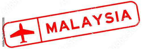 Grunge red malaysia word with plane icon square rubber seal stamp on white background