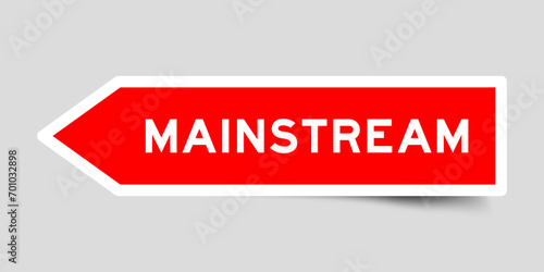 Red color arrow shape sticker label with word mainstream on gray background