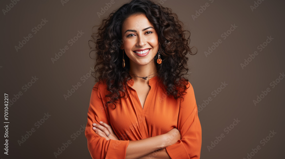 Studio portrait of a happy woman with curly hair Studio portrait of a happy woman with curly hair