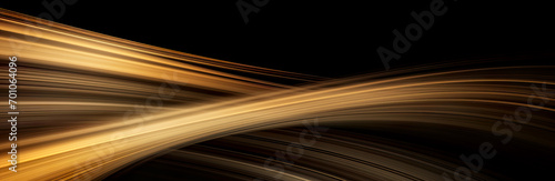 Elegant light beams in shades of caramel, copper, and gold gracefully gliding across black backdrop.Spacious card or banner suitable for businesses, industries, or luxury themes.