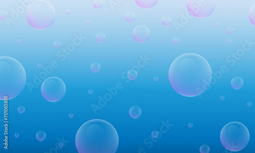 Bubbles in water on blue background.
