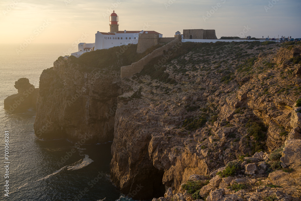 Farol do Cabo de São Vicente, latarnia morska. Sagres Portugalia. Zachód słońca