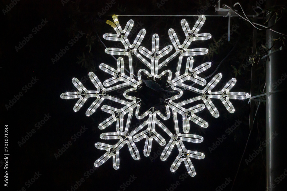 Shiny Snowflakes on a Black Background Shiny Snowflakes on a Black Background