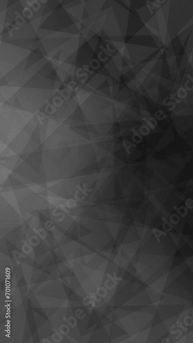 triangle shapes animate on black and gray gradient background vertical footage video clip. short video clip photo