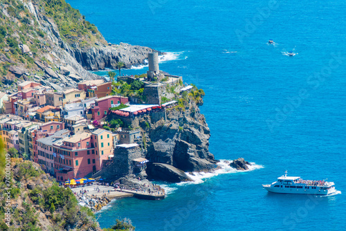 Vernazza, Italy, July 27, 2023. Tourist boat arrives in the port of Vernazza