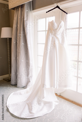 wedding dress on a hanger