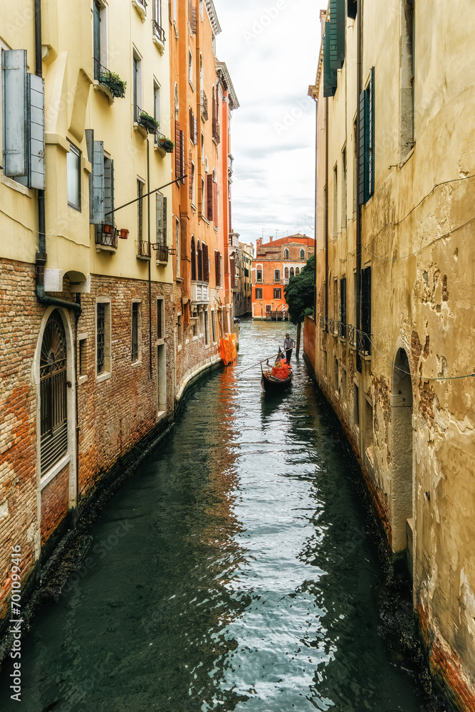 Houses in narrow canals within the city of Venice.