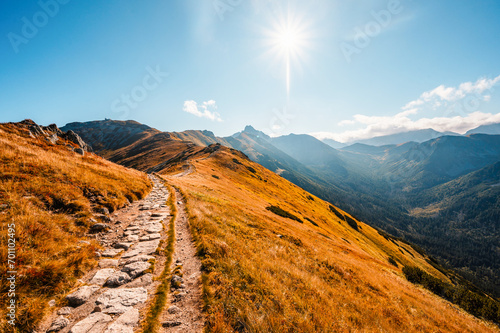 Mountain Tatras landscape. View from ridge of the Poland Tatras. Hiking from Kasprowy Wierch peak to Gievont peak . View on zakopane and Ticha valley. photo